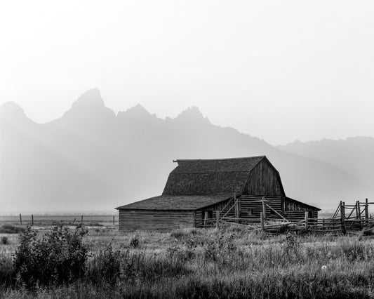 An iconic barn in Wyoming's Grand Teton National Park in front of the Teton Range near Jackson Hole.